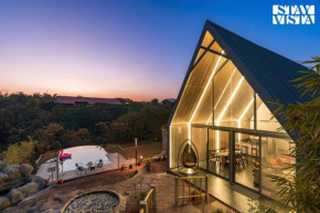StayVista's Celeste Villa - Hill-View Retreat with Infinity Pool